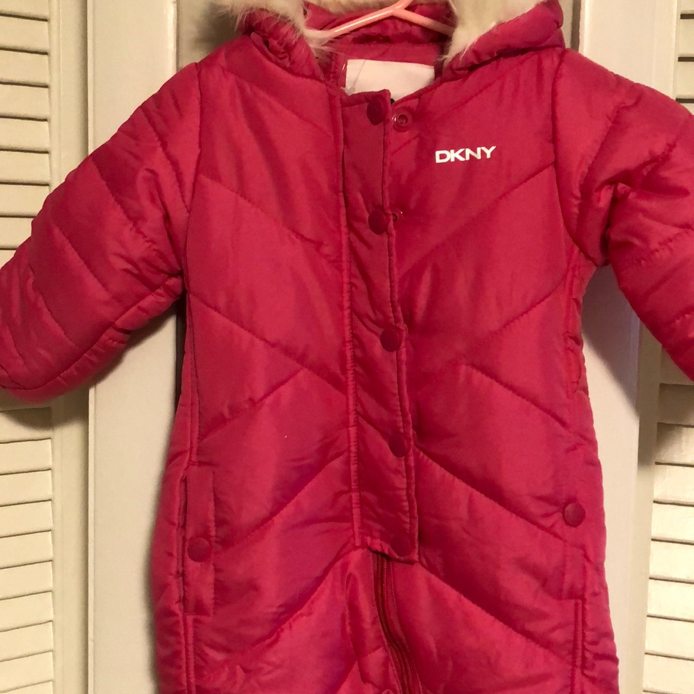 Baby snowsuit never worn.